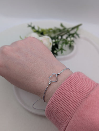 Makramee Armband mit Herz aus Edelstahl – irisierendes Band | 1118